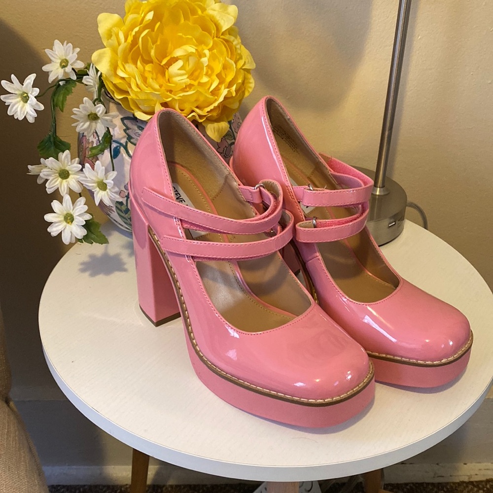 Unique bubblegum pink Steve Madden platform heels.